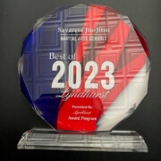 A glass award with the words " 2 0 2 3 " on it.